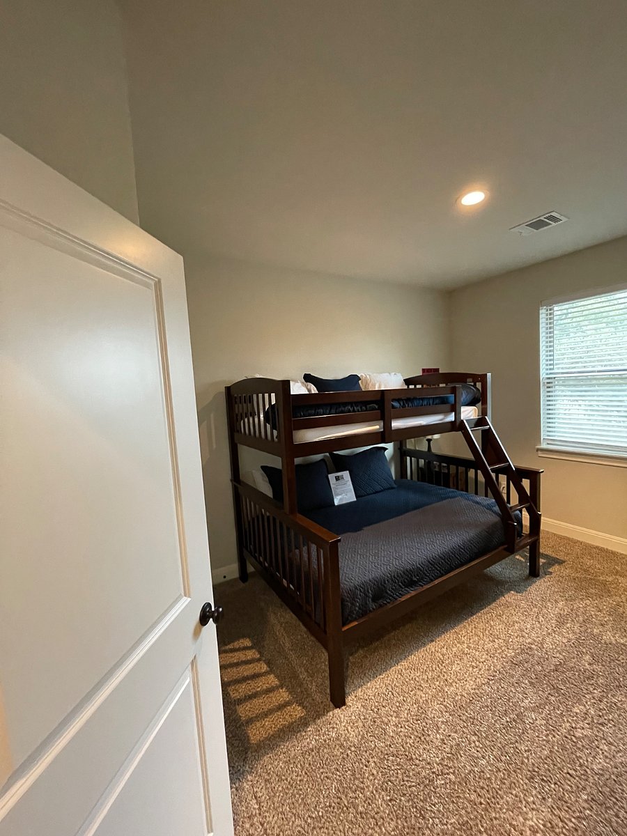 Bedroom #3 single top bunk with full size bed on the bottom.