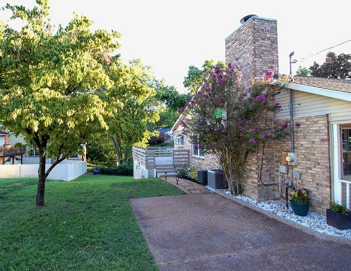side of house & single parking for lower-level unit