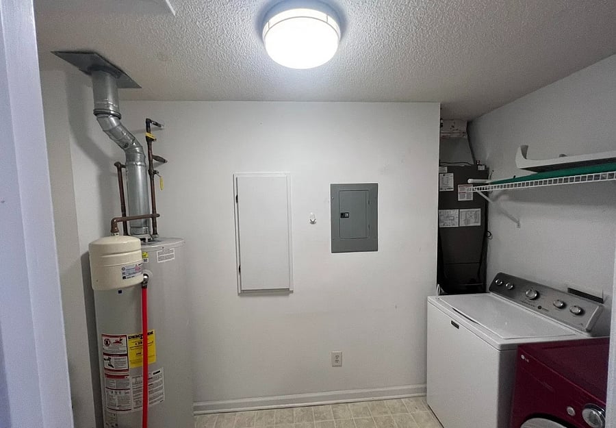 Laundry room with washer and dryer + plenty of space for storage