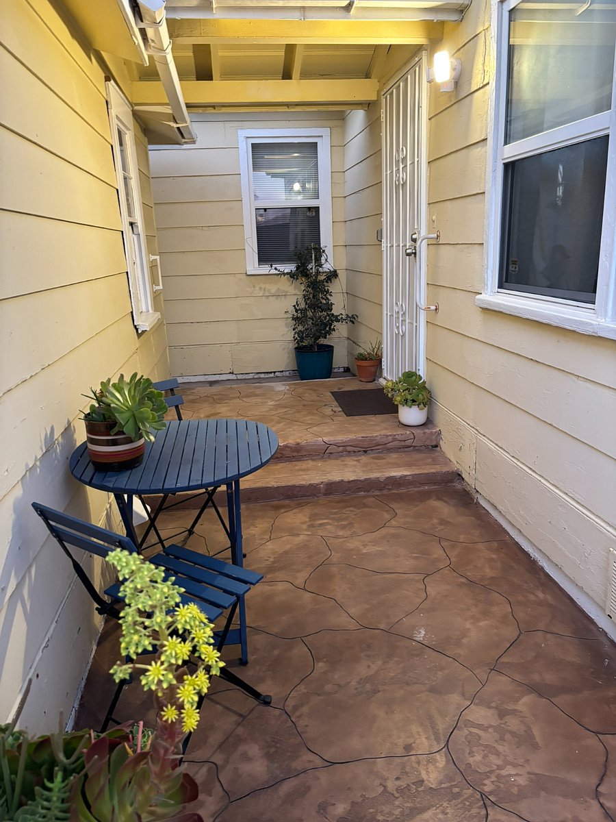 Entryway to home - access to front door and backyard.