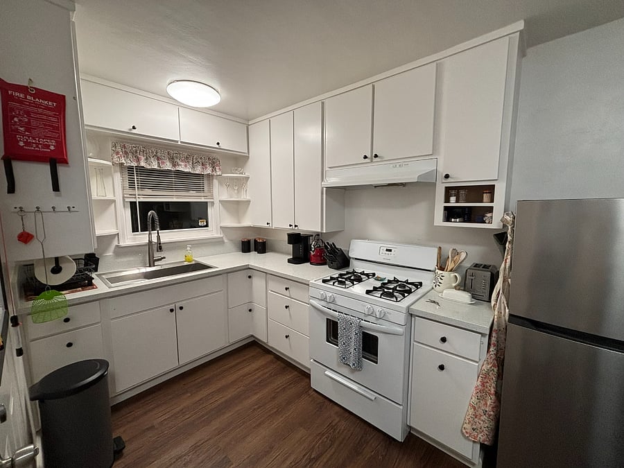 Full size fridge, gas range, oven, microwave, and plenty of storage.