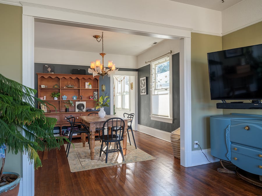 In the living room, looking into the dining room