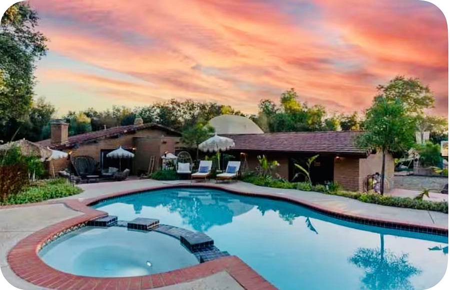 Swimming pool with hot tub.
