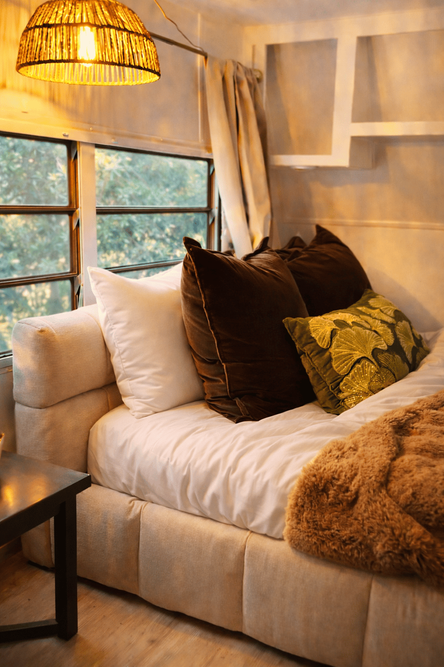Casita 1 Bedroom (Queen Bed), features built-in bookcase, closets and drawers for clothing storage.