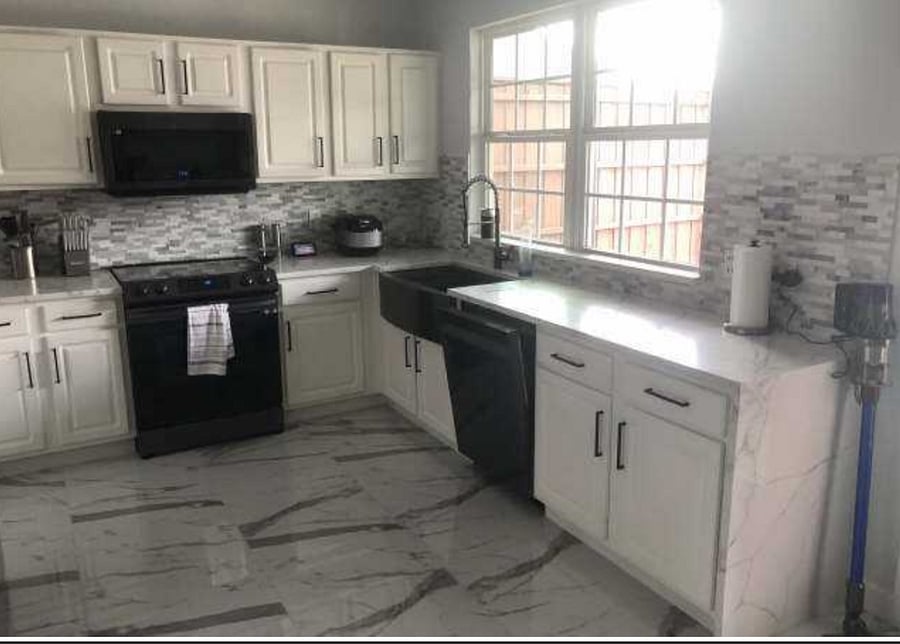 All black appliances with quartz countertop