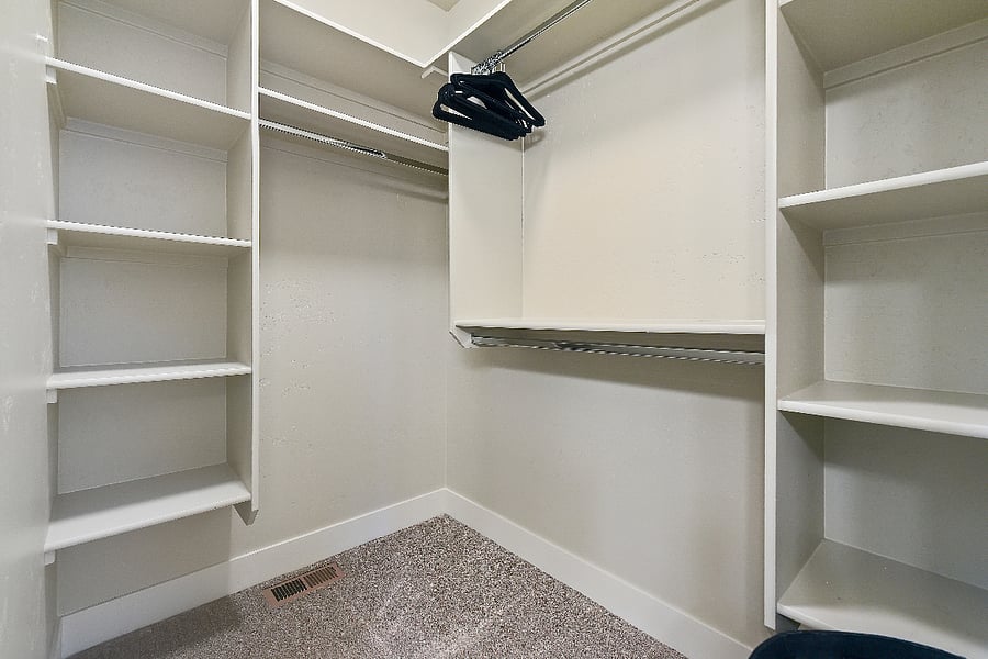 Large primary closet offering generous storage and hanging space.