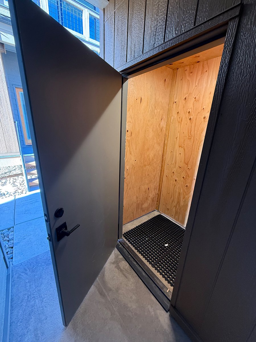 Private exterior storage ideal for skis and outdoor gear.