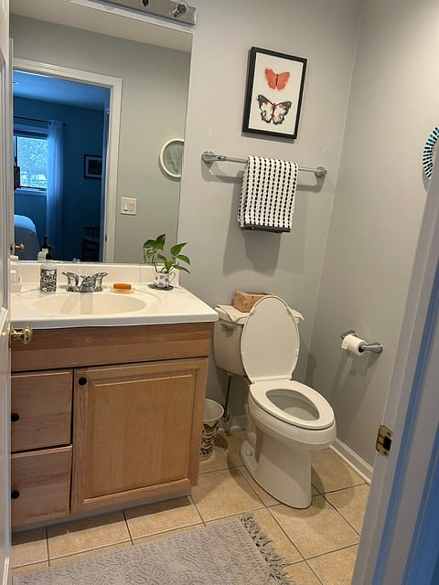 Half bathroom attached to primary bedroom