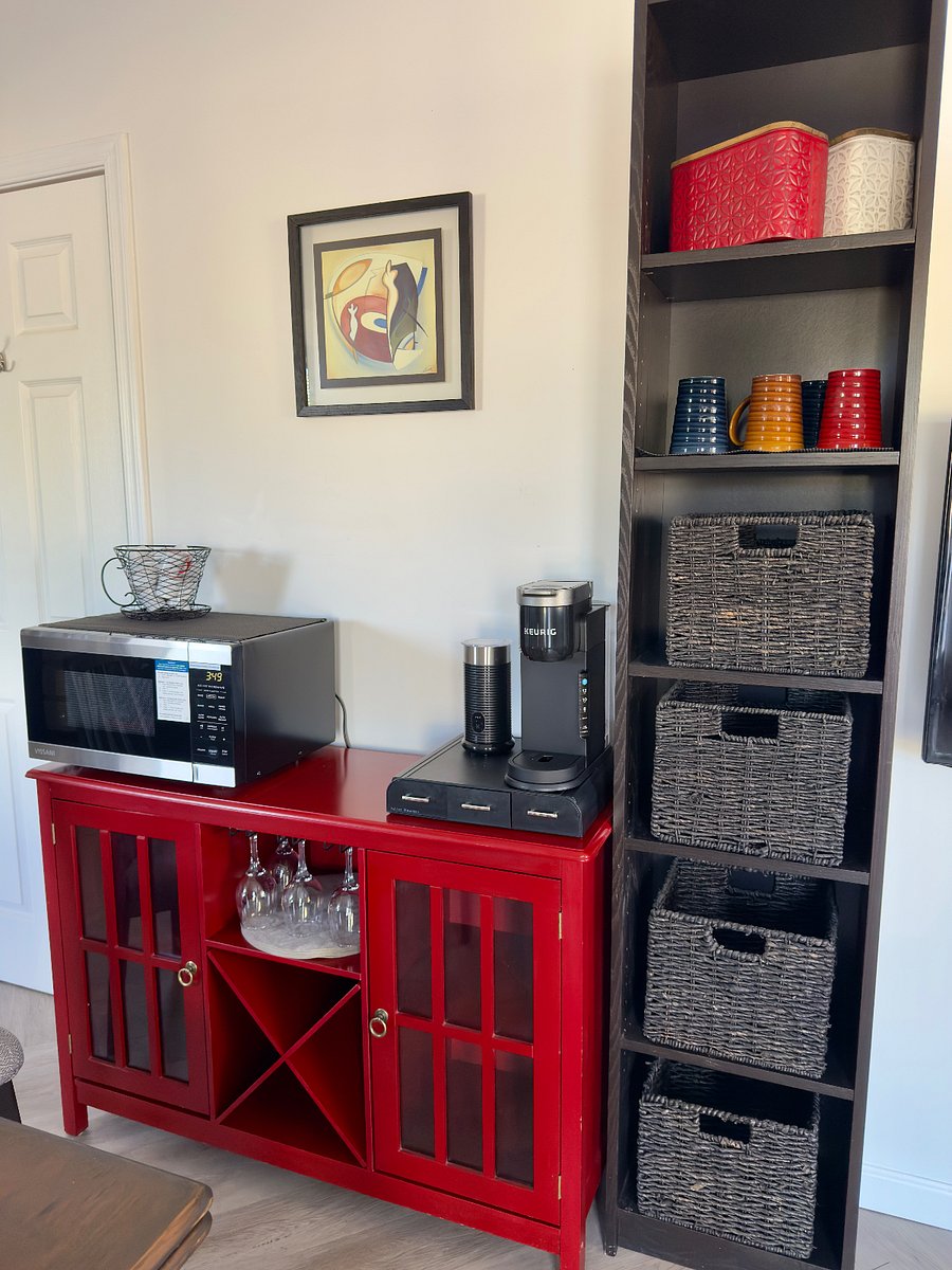 Coffee bar with Keurig and milk frother, coffee pods, tea, etc.