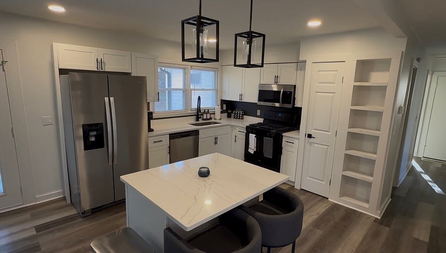 Fully equipped kitchen with cookware, utensils, dishes, glassware, and coffee maker truly move-in ready.