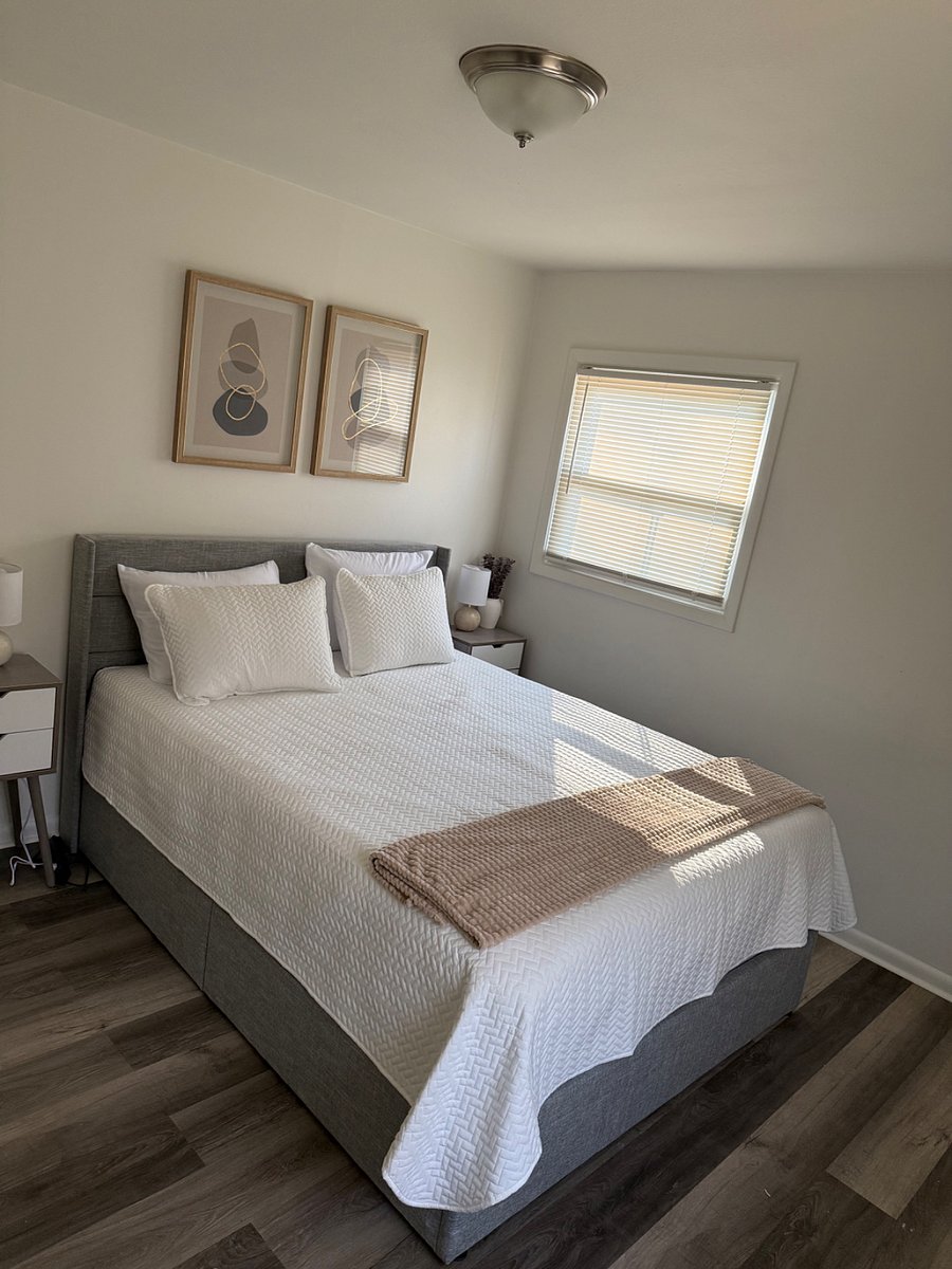 Comfortable guest bedroom with a cozy setup for restful stays.