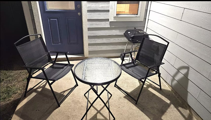 Outdoor sitting area with fully fenced in yard for you fur babies. Use the grill anytime.