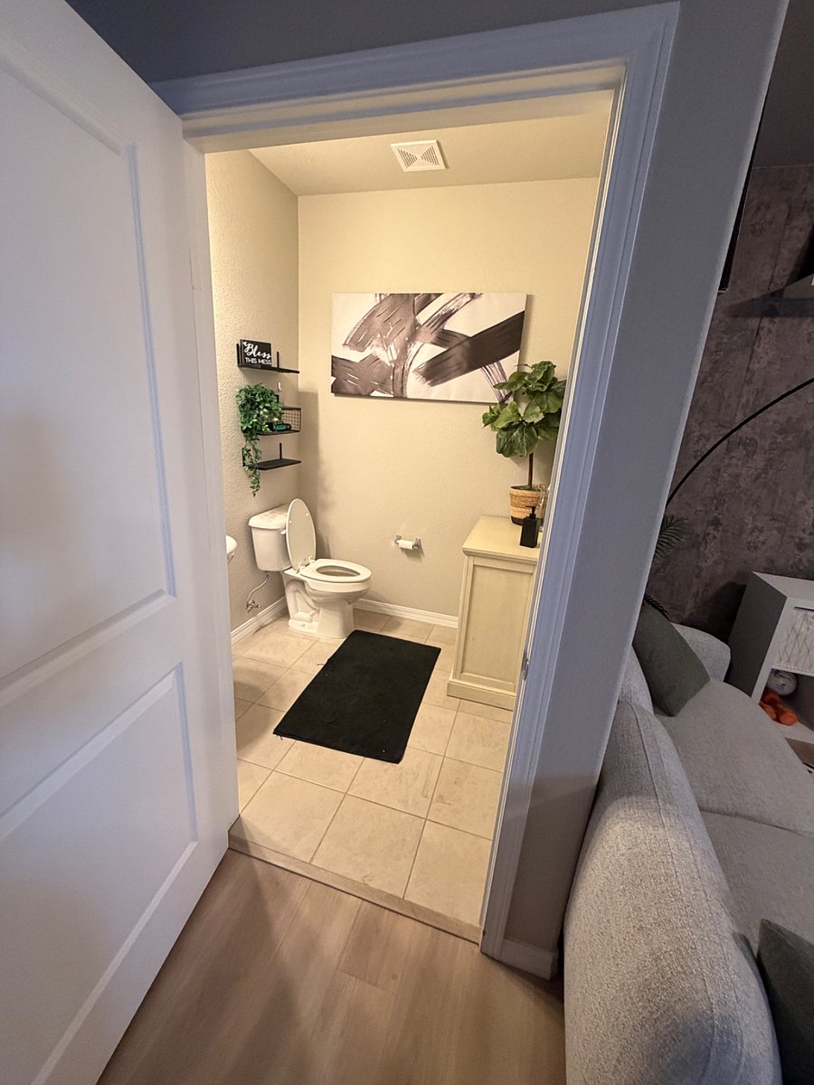 A conveniently located first-floor bathroom adds comfort and functionality, making it perfect for guests or daily use without needing to go upstairs.