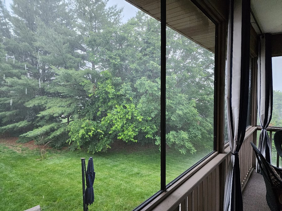 Garden view from Balcony screened in porch with table and fire pit to watch the Missouri wild life and famous Cardinals