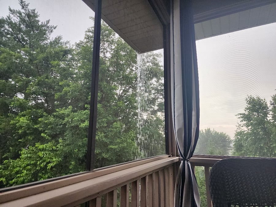 Garden view from Balcony screened in porch with table and fire pit to watch the Missouri wild life and famous Cardinals