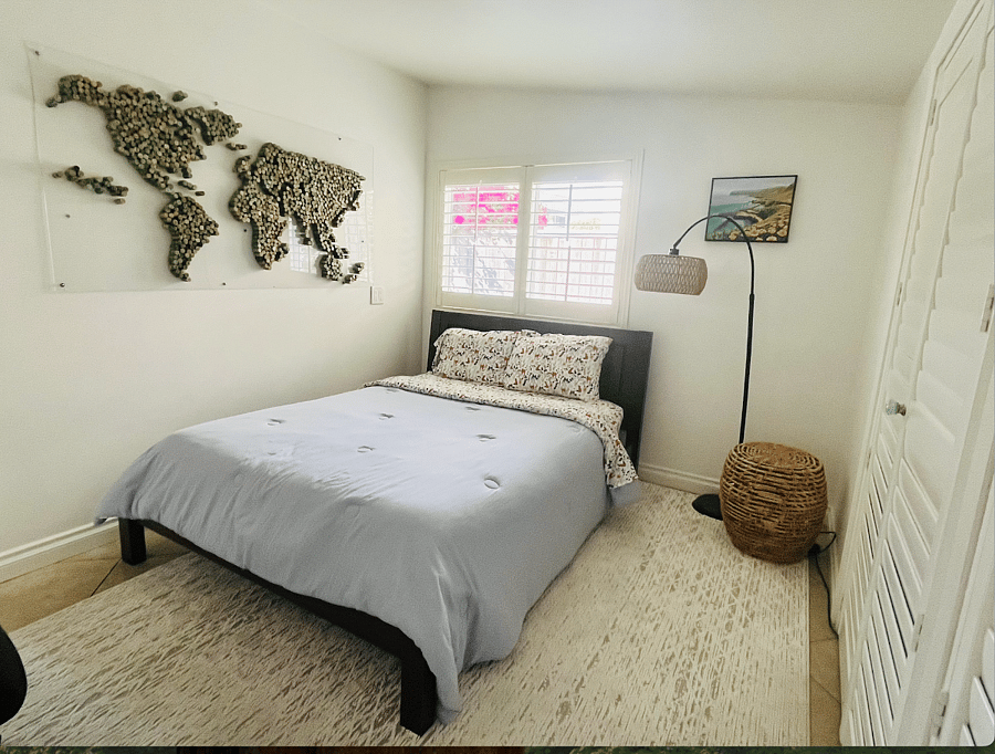 Downstairs bedroom has a hidden optional work station.