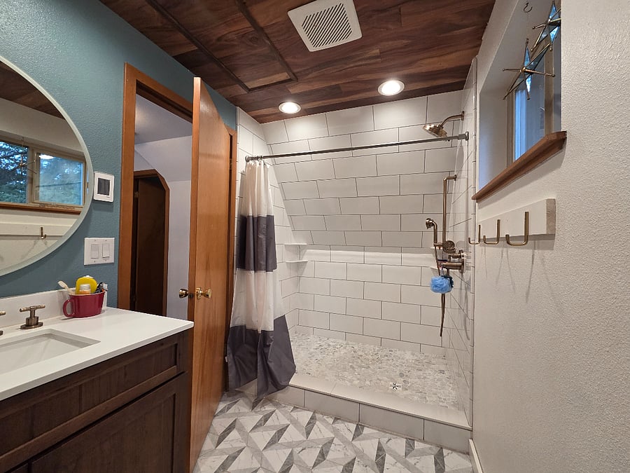 Master bathroom, large shower and radiant heat flooring.