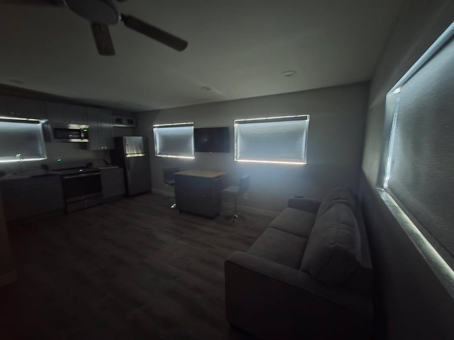 Remote controlled black-out blinds.