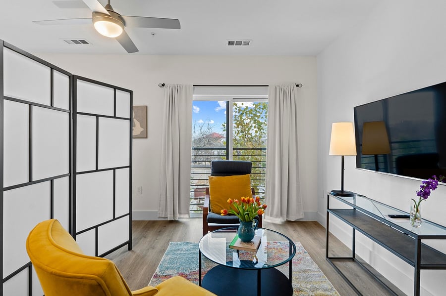 Listing now has a sofa instead of two chairs.