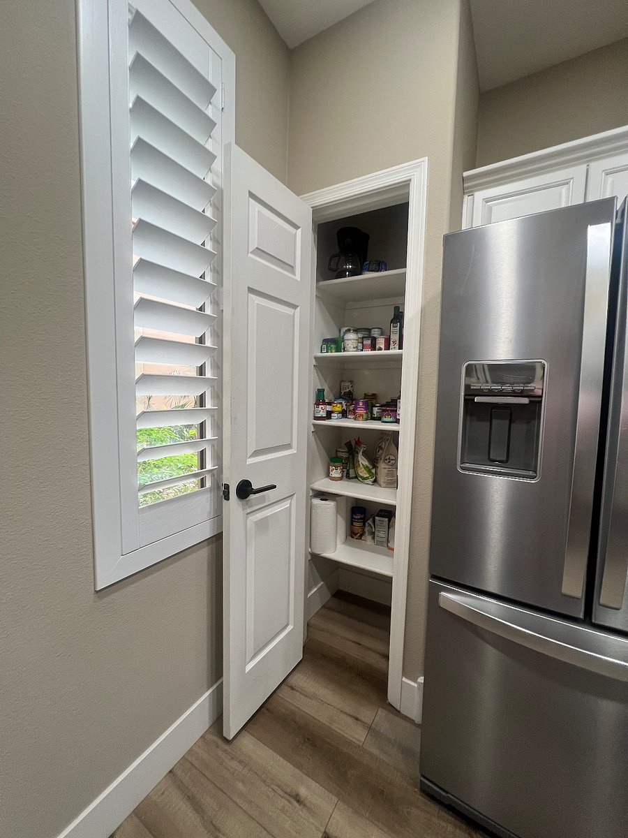 Convenient pantry and water available on refrigerator door.