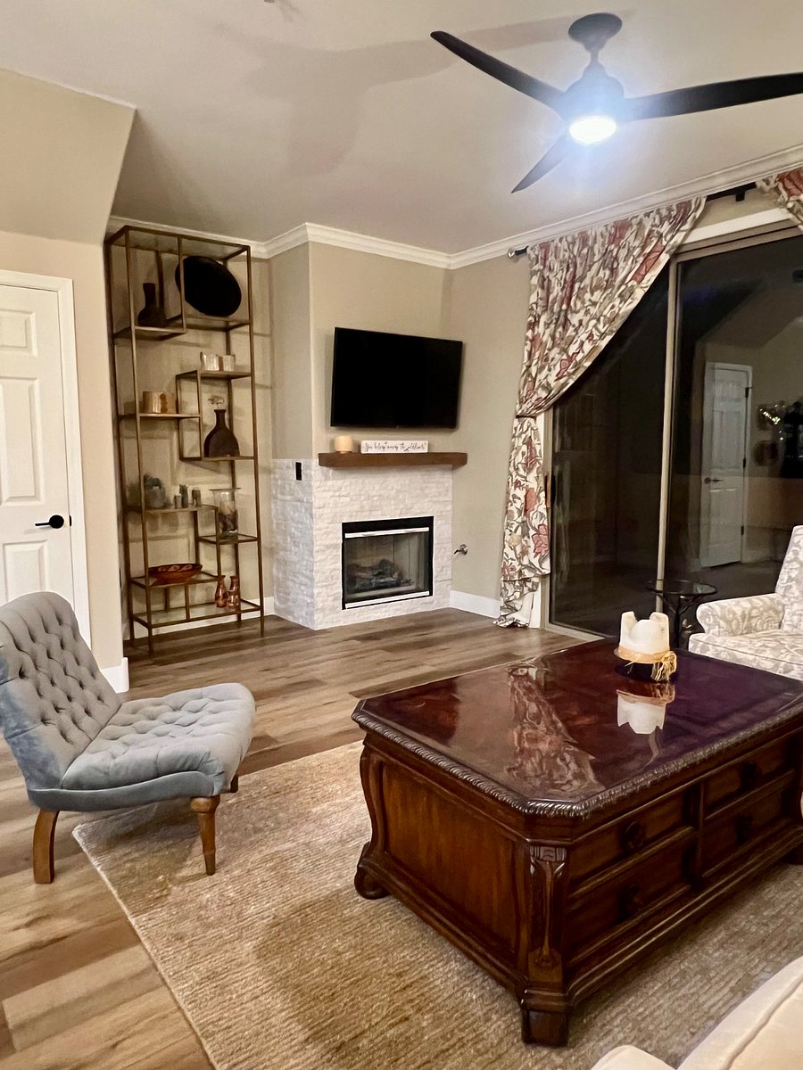 Gas fireplace with wood mantel. Enjoy the natural light of all the sunny days.