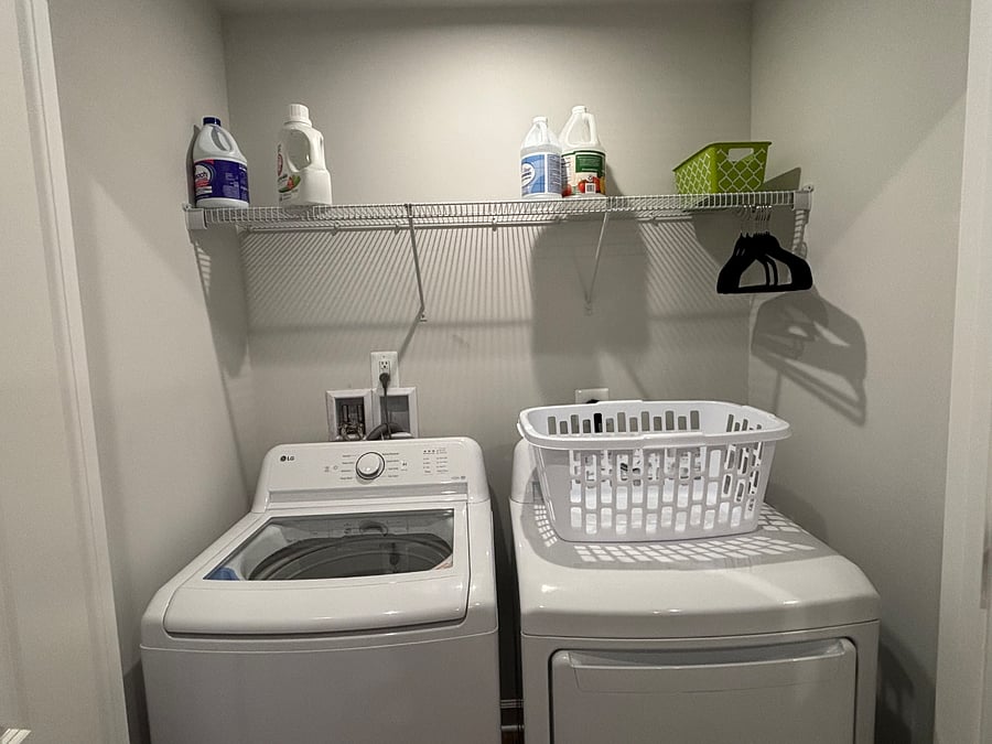 Upstairs laundry closet with new washer/dryer