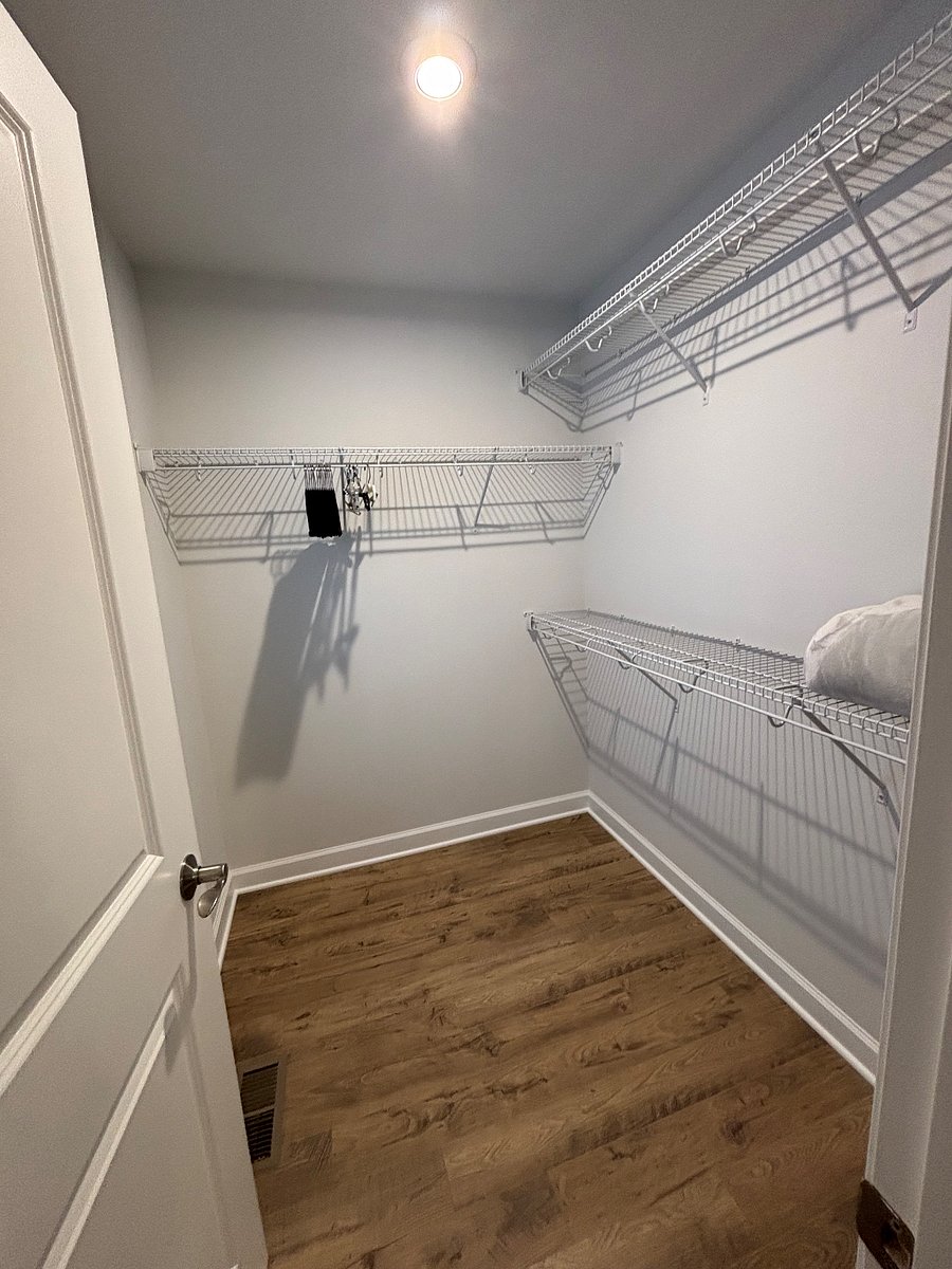 Large walk in closet in primary bedroom 