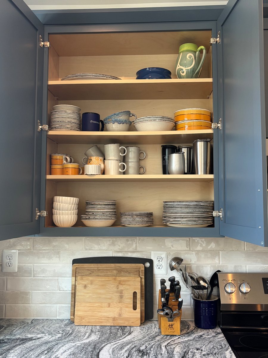 Kitchen is fully stocked with all the dishes and cooking utensils you need