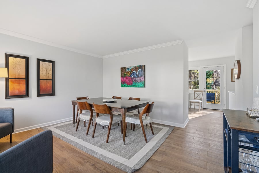 Bright and cheery dining room with seating for six.