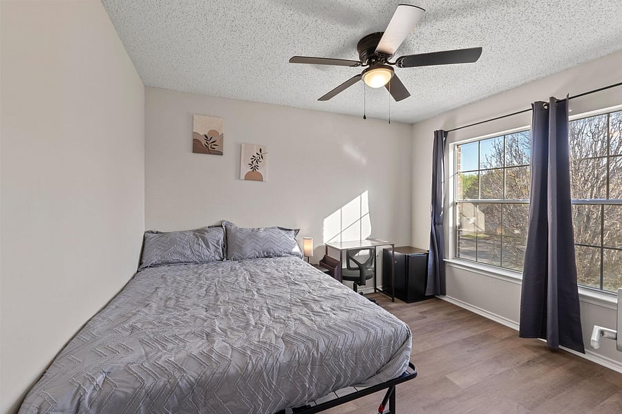 Bedroom large windows to bring in natural light.