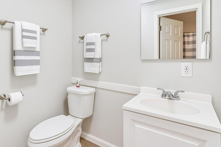 Fresh private bathroom with a clean look and added comfort for your daily routine
