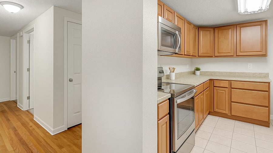 Practical shared kitchen and dining space with a warm, easy feel