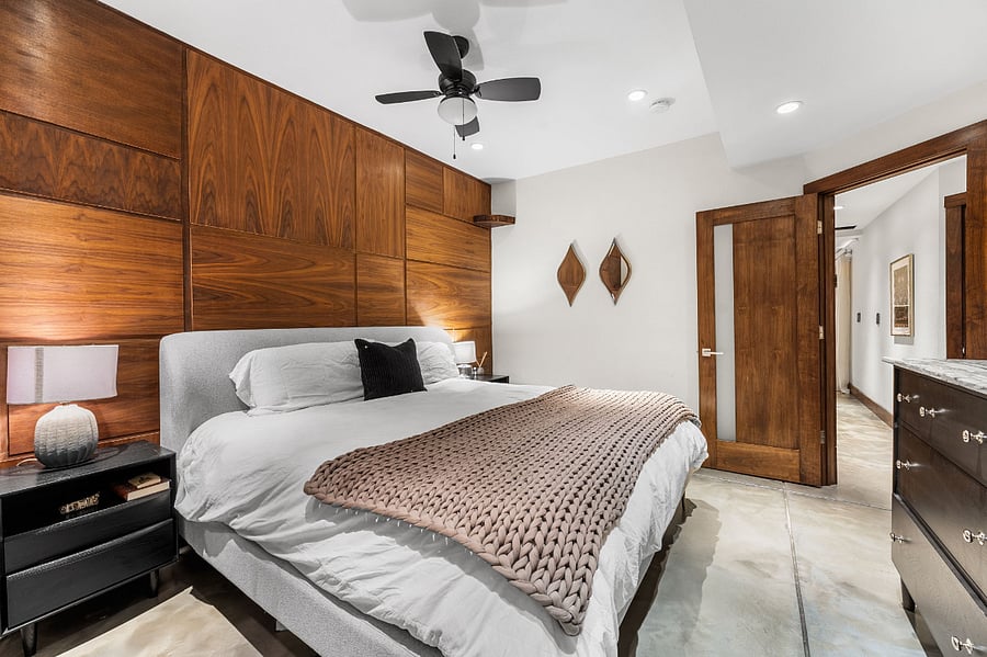Downstairs master bedroom with king bed and tv