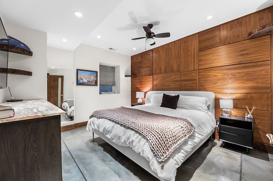 Downstairs master bedroom with king bed and tv