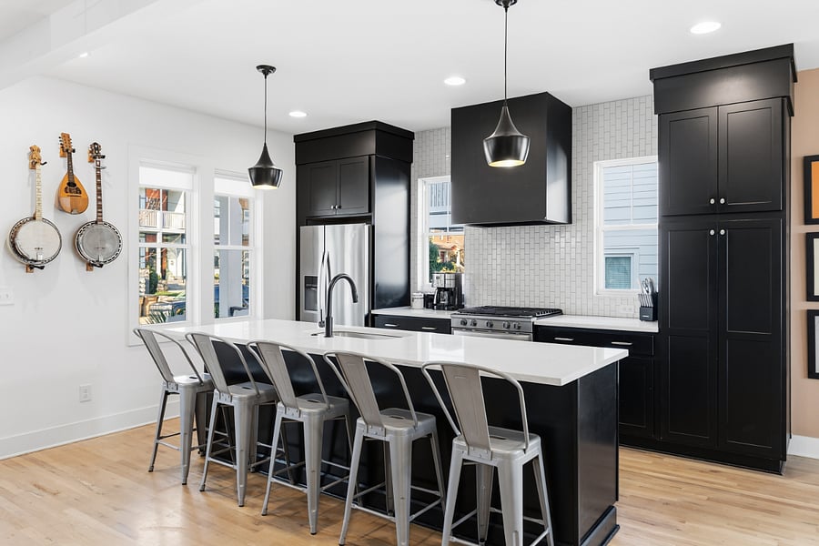 Spacious, fully-equipped kitchen for all your cooking needs. Modern appliances, natural lighting, and a large kitchen island with seating for 5.