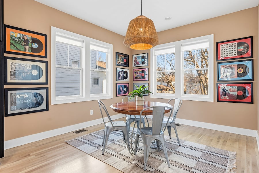 Dining area with seating for 4, open concept layout connected to the kitchen.