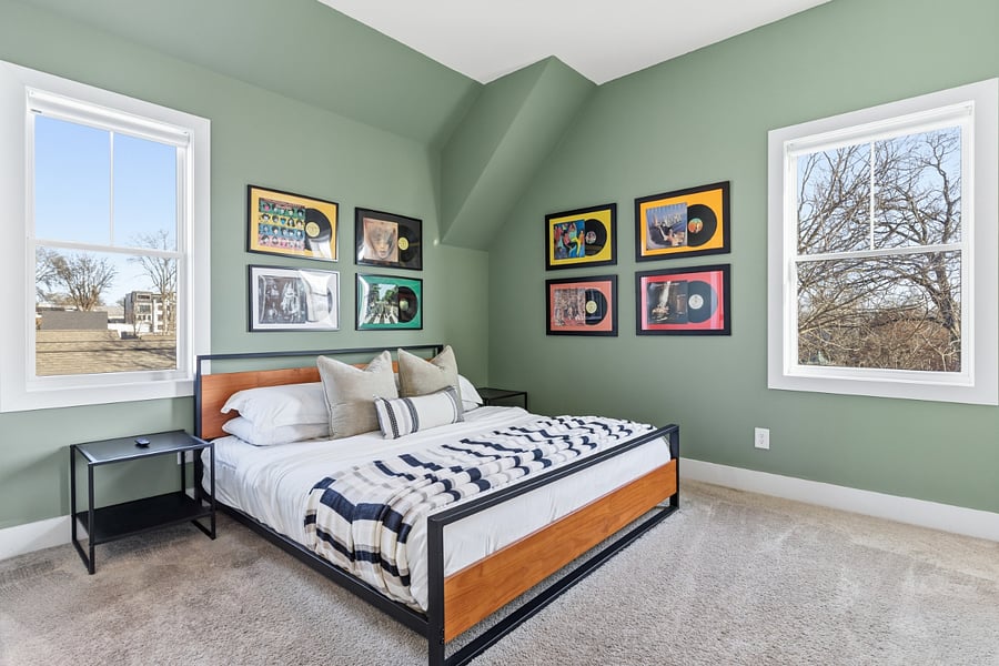 Primary bedroom with king-sized bed and ensuite full bathroom. Located on the 2nd floor.