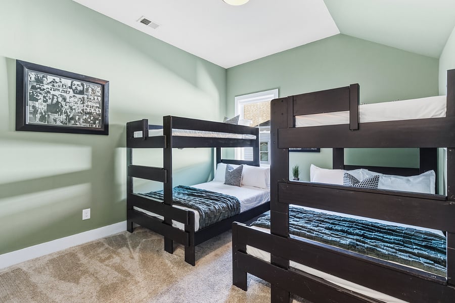 Bedroom 3 features two, twin-over-queen bunk beds. Includes a walk-in closet and smart TV with access to all the streaming apps.