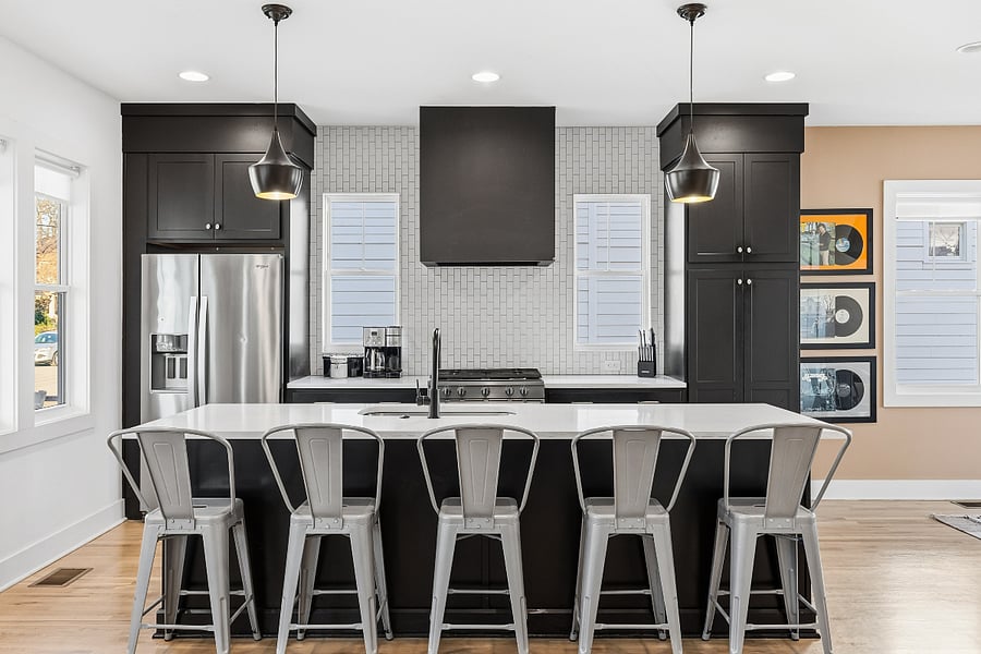 Spacious, fully-equipped kitchen for all your cooking needs. Modern appliances, natural lighting, and a large kitchen island with seating for 5.