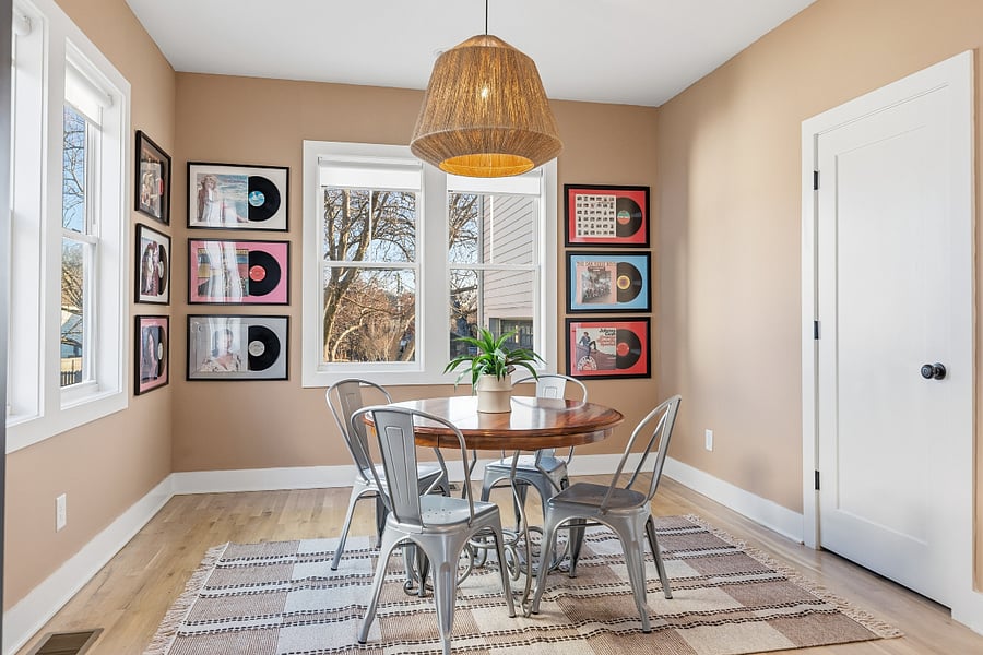 Dining area with seating for 4, open concept layout connected to the kitchen.