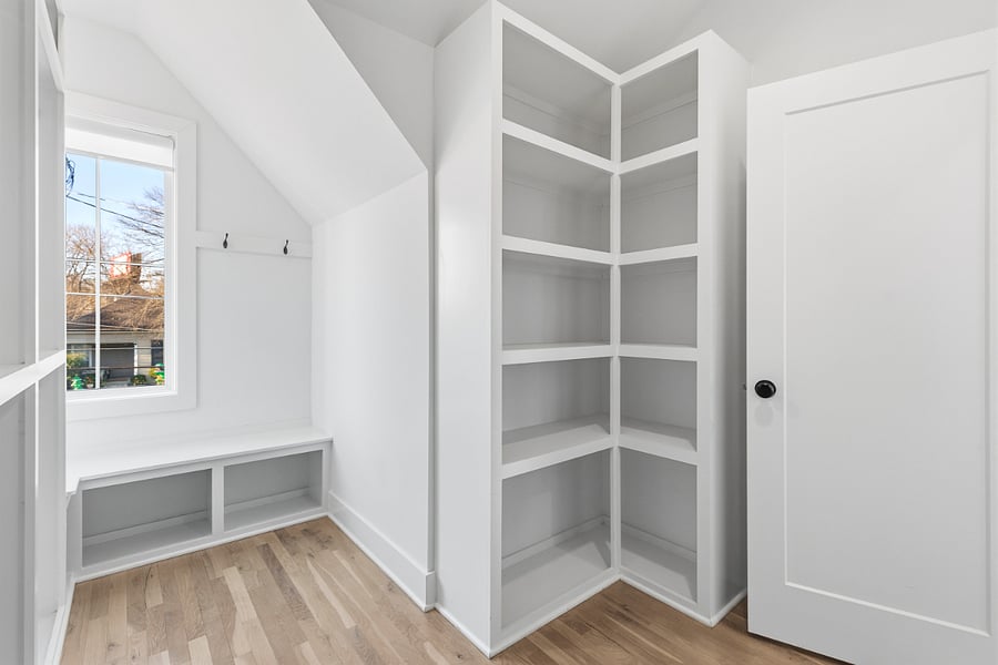 Bedroom 2 includes a queen and king bed, two accent chairs, and a smart TV with access to all the streaming apps. It also has a huge walk-in closet and large ensuite bathroom.