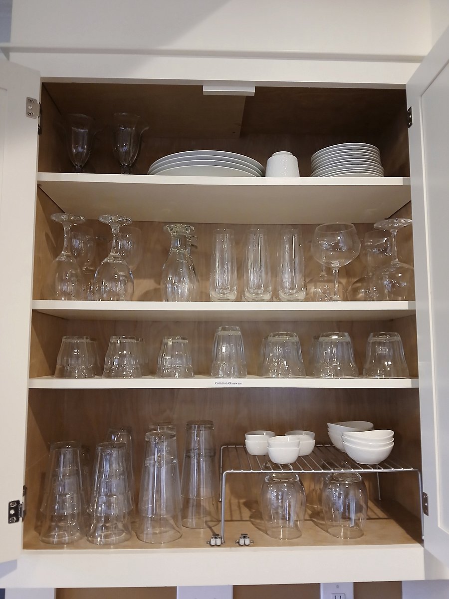 Kitchen has excellent supply of cooking, baking and dishware