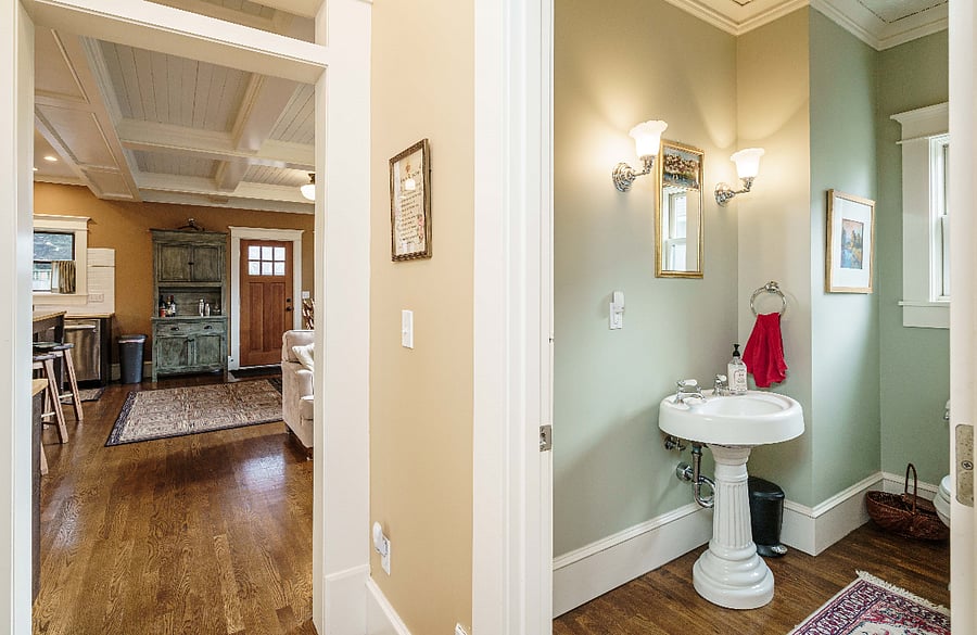 Powder room next to kitchen/great room