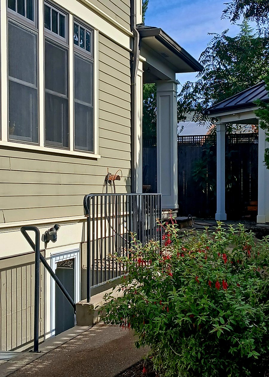 Private apartment entrance on side of house