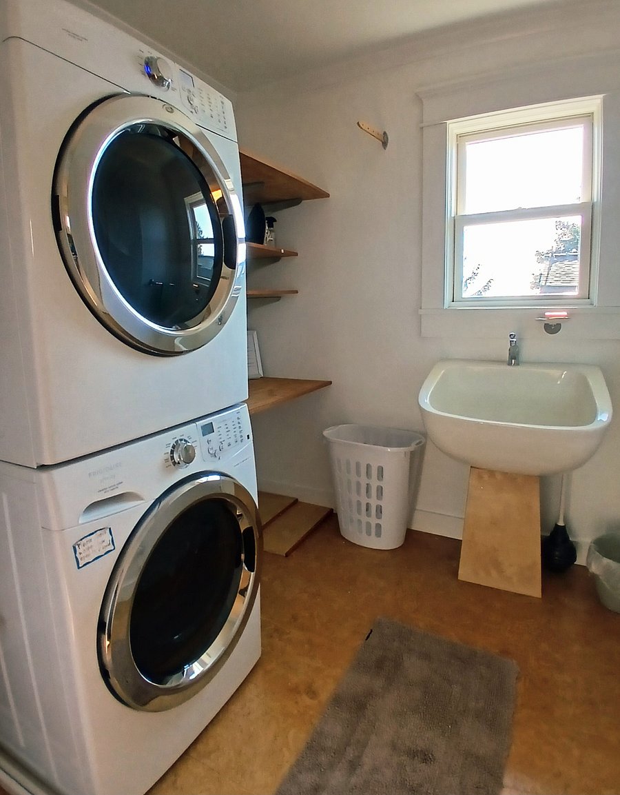 Shared laundry room on second level of home