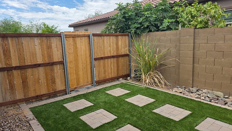 Manicured private fenced in yard