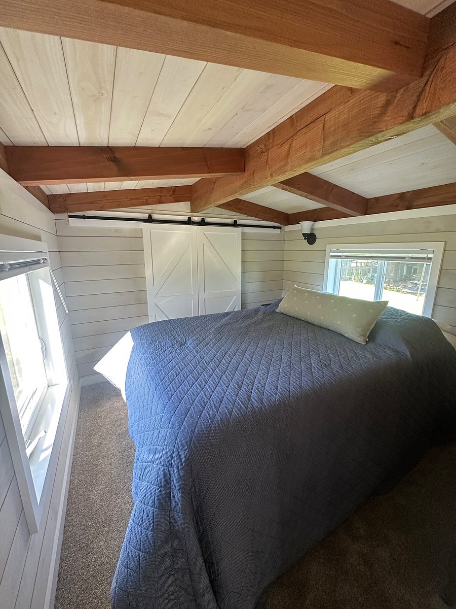 Loft bedroom with closet on back wall