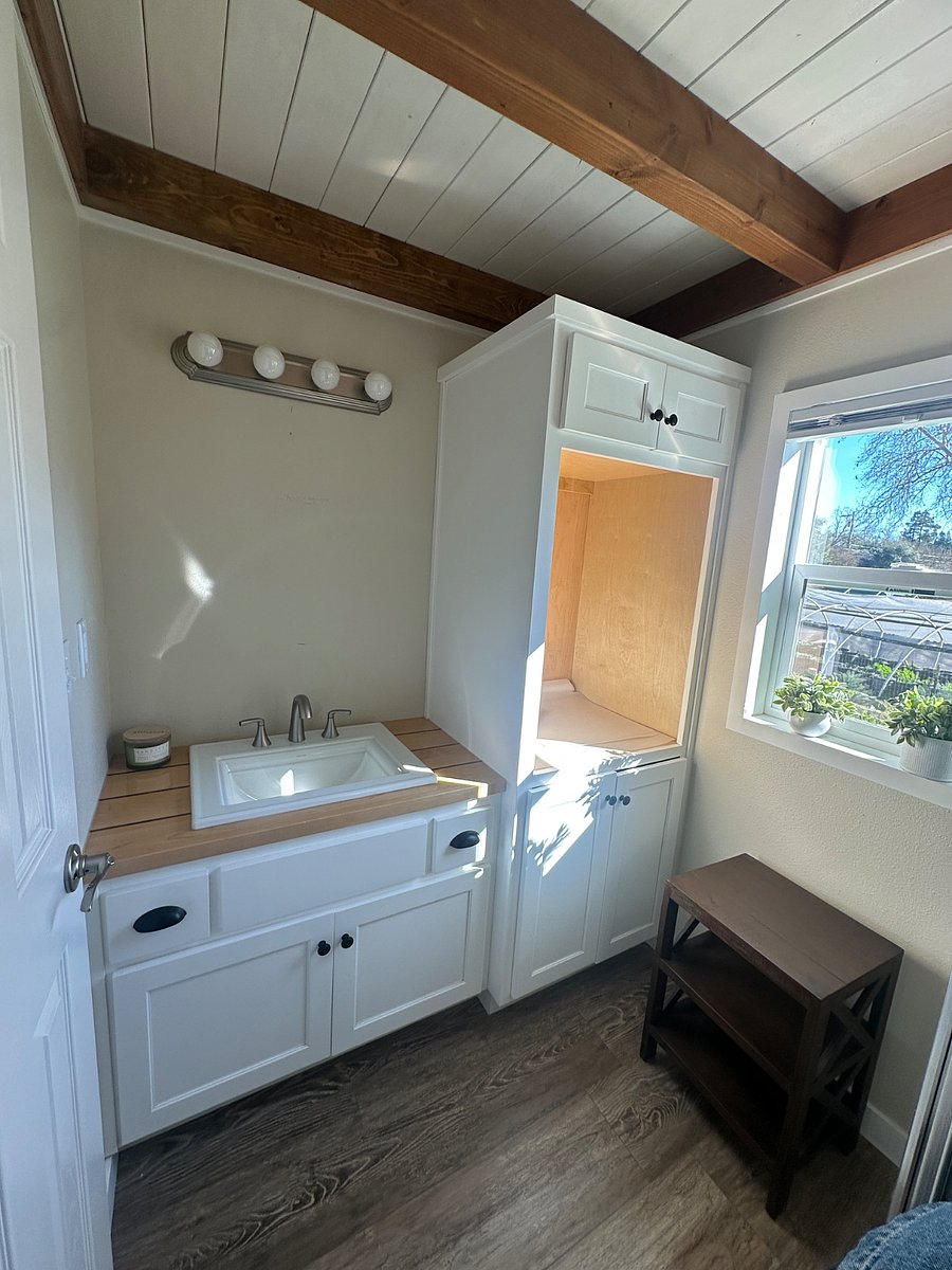 Bathroom sink, mirror and shelving to be installed before move in