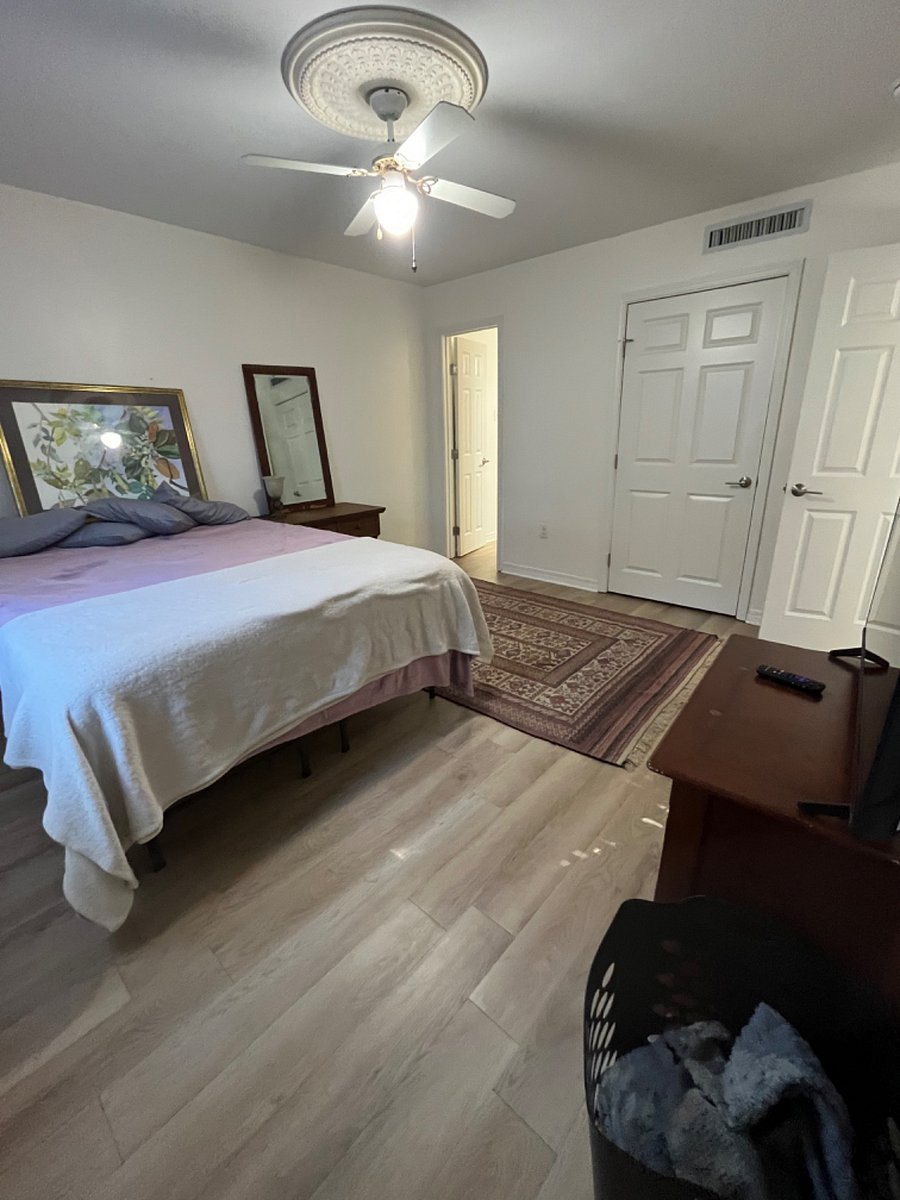 Bedroom with queen bed, 2 dressers and a closet, Roku tv, will be hanging the rest of the art soon!