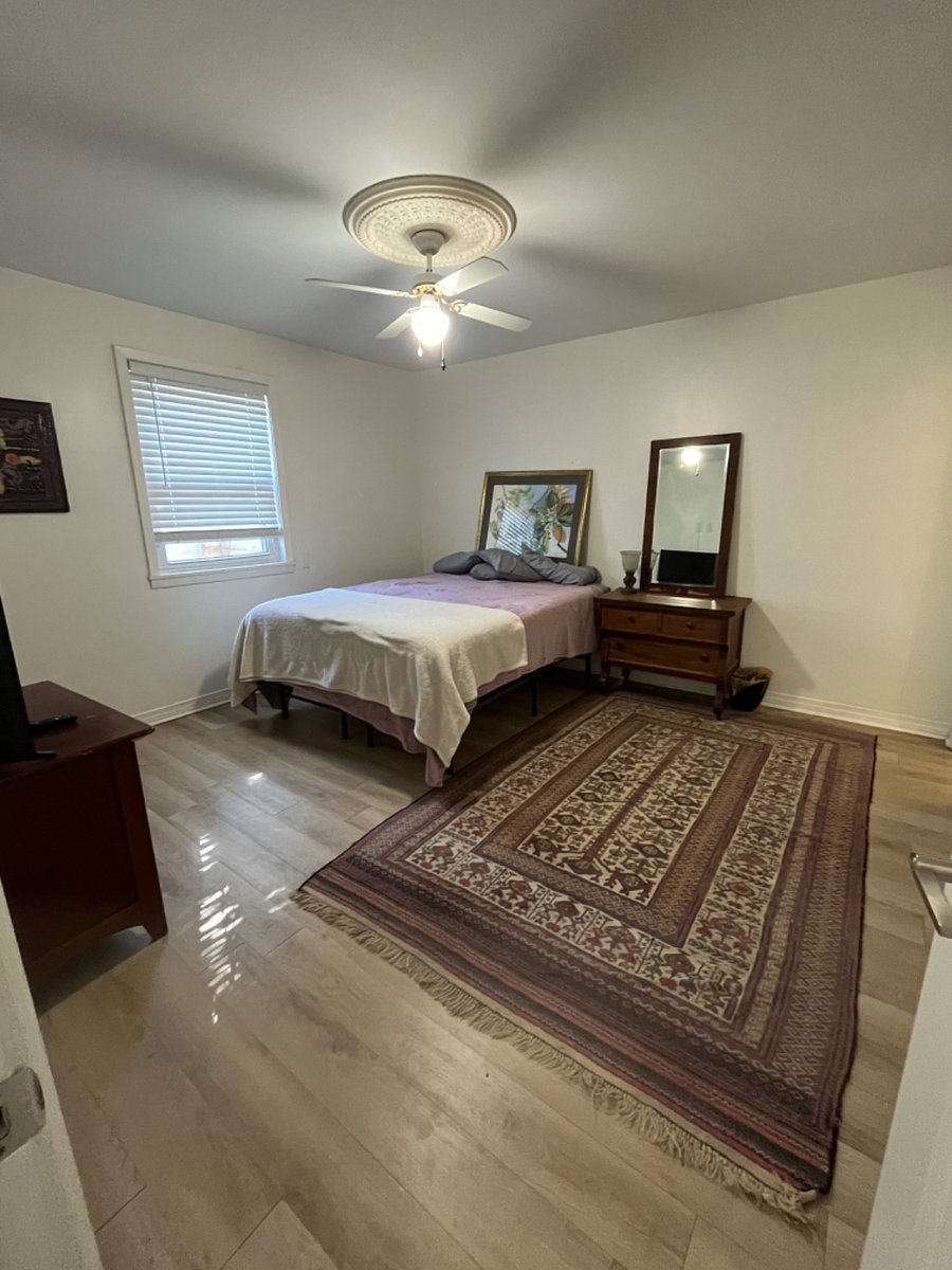 Bedroom with queen bed, 2 dressers and a closet, Roku tv, will be hanging the rest of the art soon!
